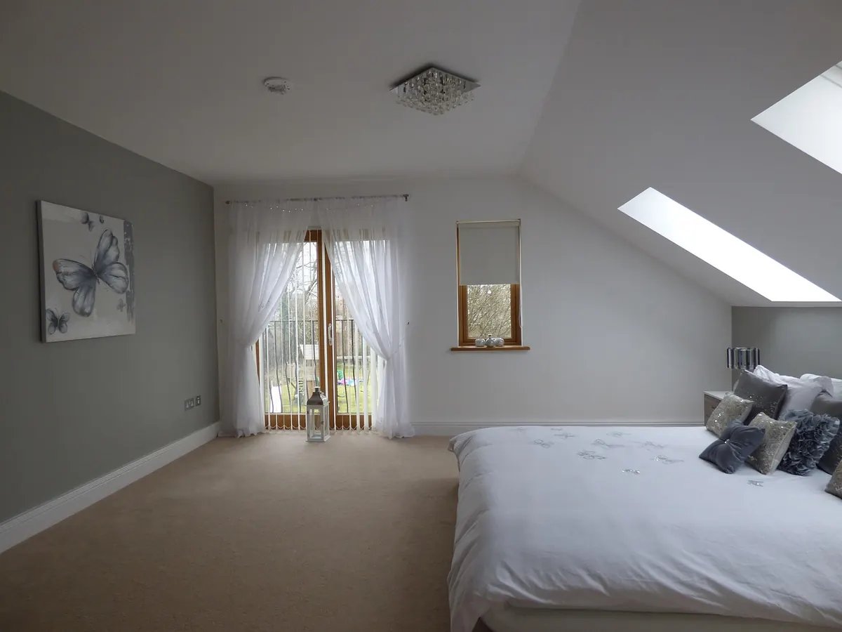 Small Loft Bedroom Ideas That Make the Most of Sloped Ceilings